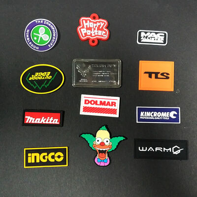 Eco-friendly Low Moq Garment T Shirt Fashion Brand Name Hats Bags Silicon Embossed Badges Sewing on Custom Patches 3d Soft Pvc L