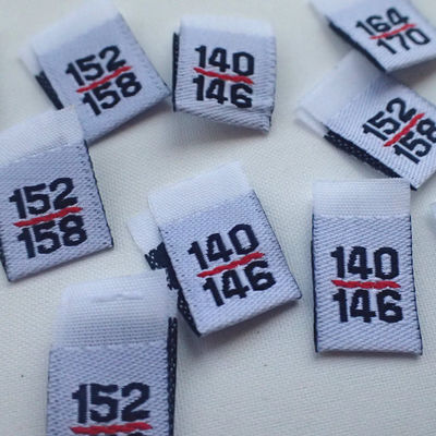 Cosa en el inglete del algodón doblan etiquetas imprimibles de la ropa